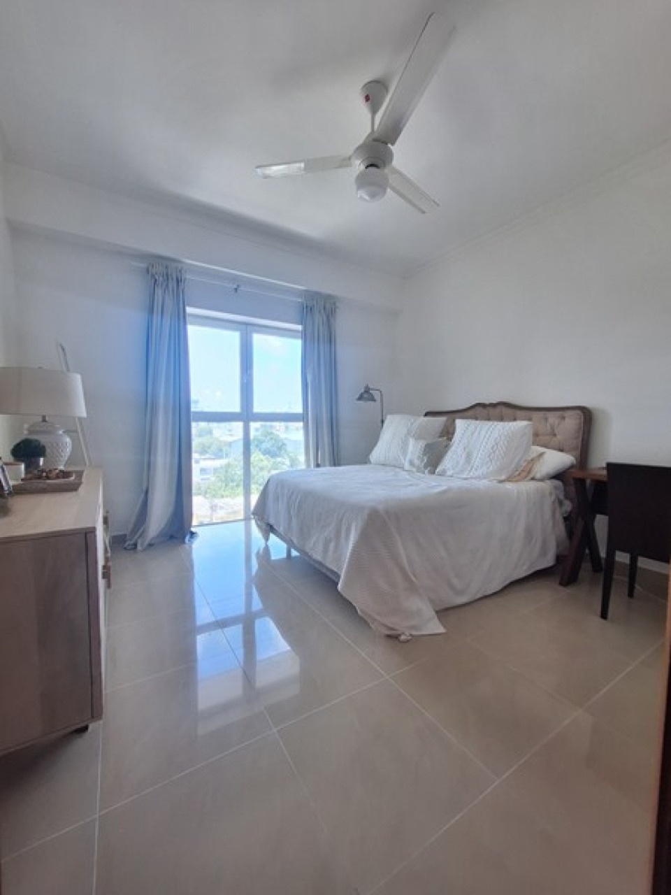 Bedroom with balcony view