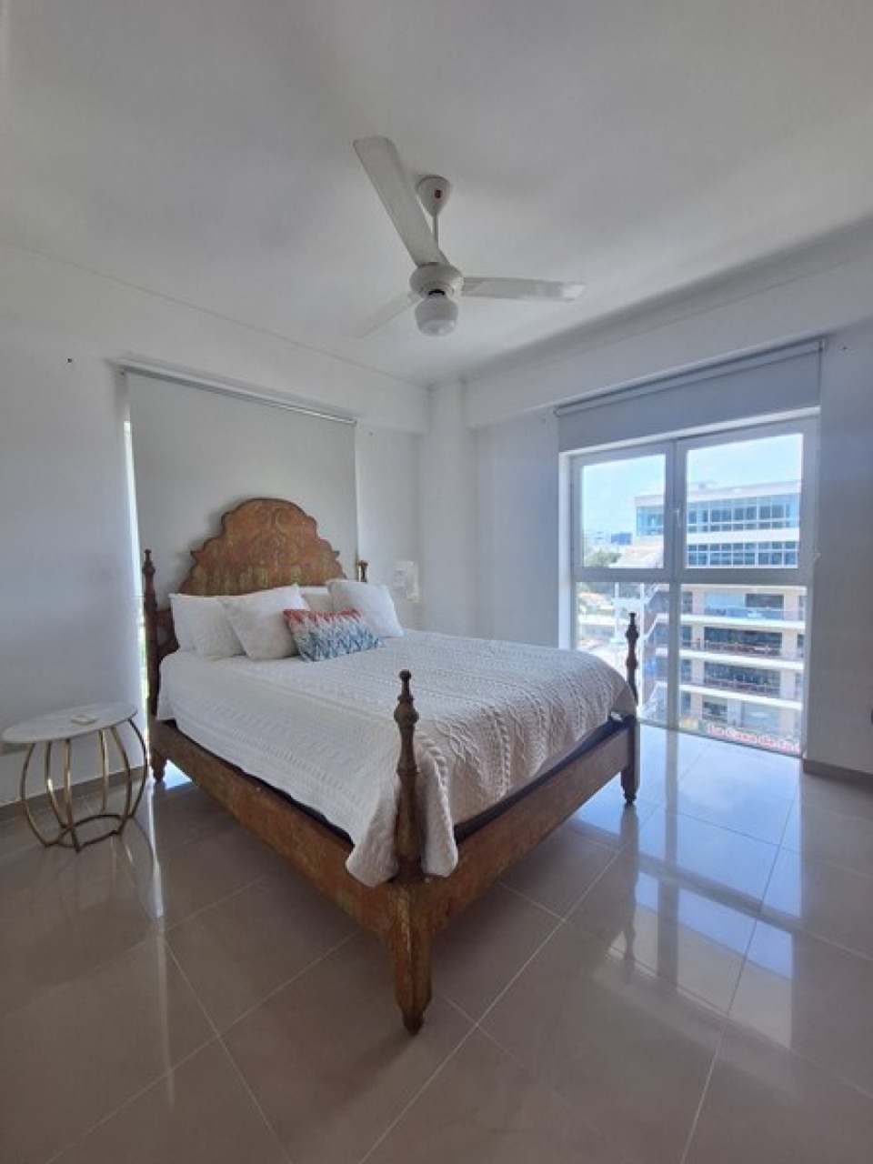 Bedroom with wooden bed frame