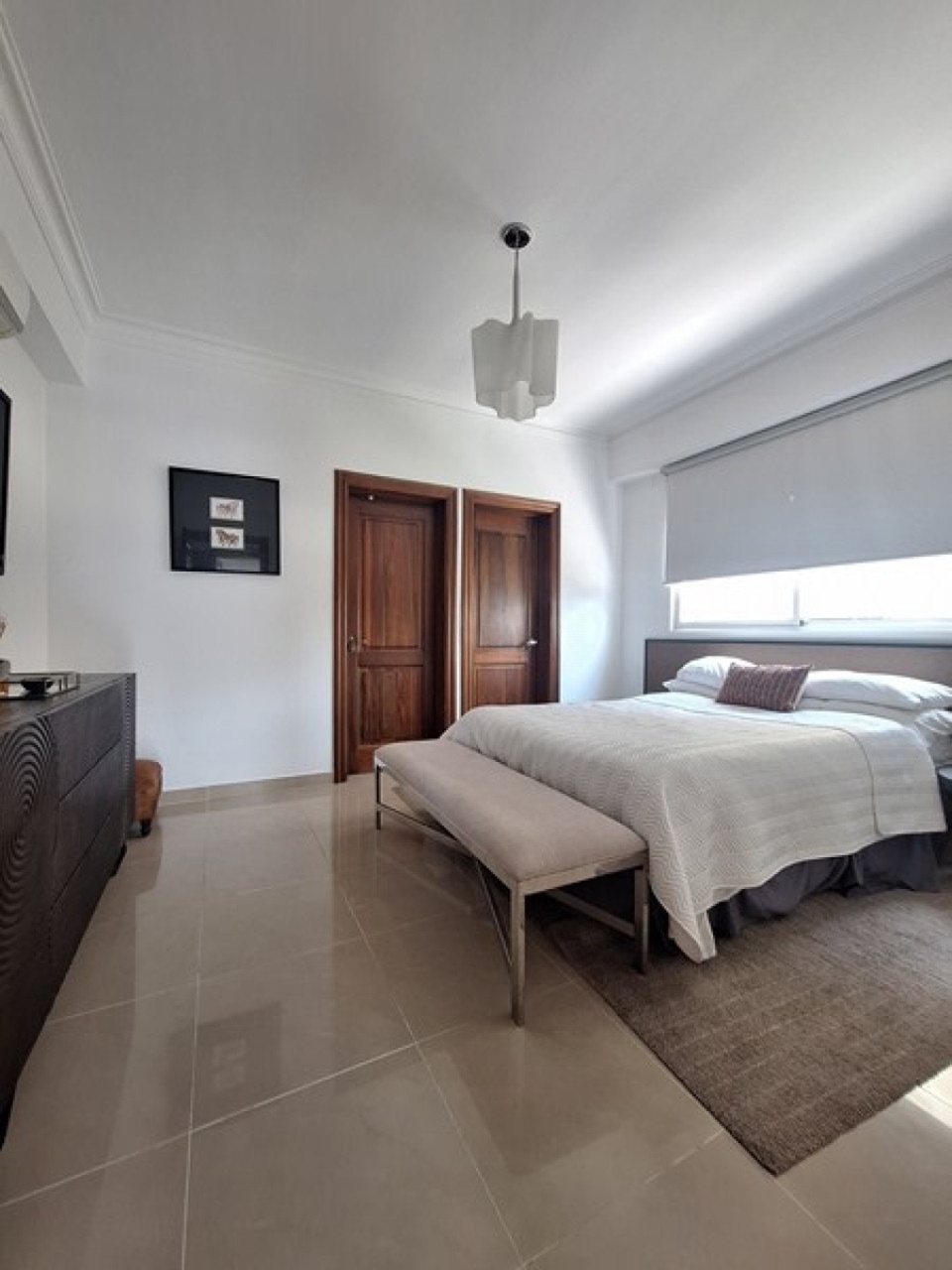 Master bedroom with mahogany doors